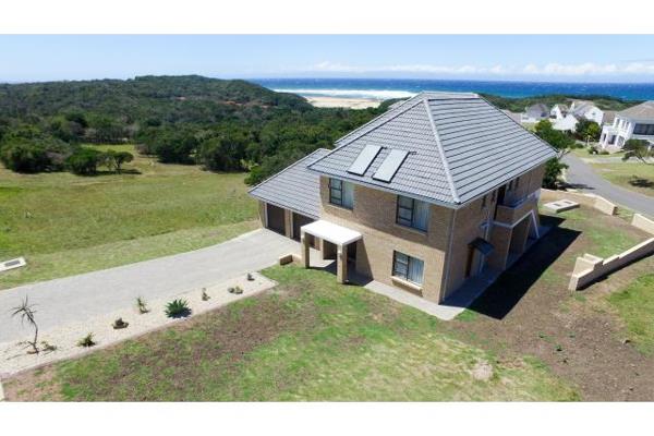 This stunning modern 5-bedroom home is situated in a prime location with breathtaking ocean views. The face-brick double volume design ...