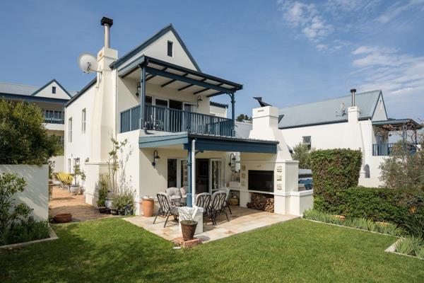 This is an opportunity to live in a truly stunning property located within a popular Somerset West security estate. It is ideally ...