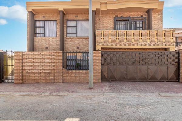 Spacious 4-bedroom double-storey house in the heart of Dobsonville is a versatile ...