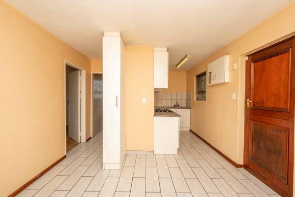 JOINT MANDATE - Newly renovated bathroom with nice finishes.  Open plan lounge with new tiles flowing to the practical kitchen.  Single ...