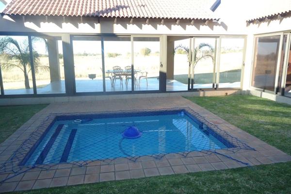 Next to green area 4 bedrooms,4 bathrooms,dining room,lounge with inside braai area,tv room
kitchen  with gas stove and oven ...