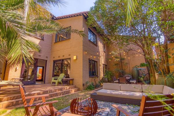 Set under a canopy of trees in a beautifully landscaped oasis, this home in an excellent position is as welcoming as it is immaculate. ...