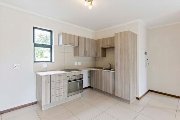 This upmarket and spacious 2 bedroom, 2 bathroom executive unit consists of.

A modern kitchen with ample cupboard and storage space ...