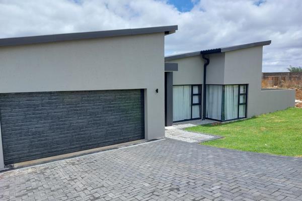 This home is newly built. It is modern with lovely finishes and flows beautiful from one ...