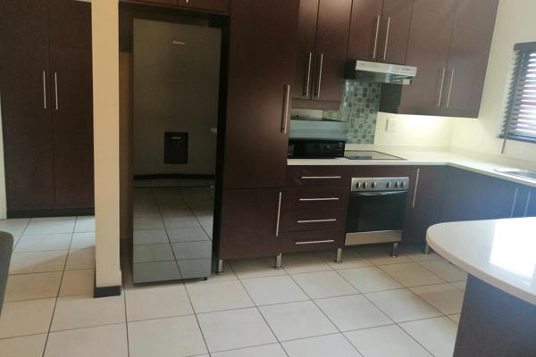 Modern Spacious One Bed Garden Unit.Tiled Throughout with Wooden Floors in the ...