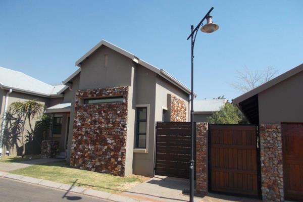 3 bedrooms, 2 full bathrooms, main bathroom has a double shower and also two basins, Sunny covered braai, entrance hall, TV room ...