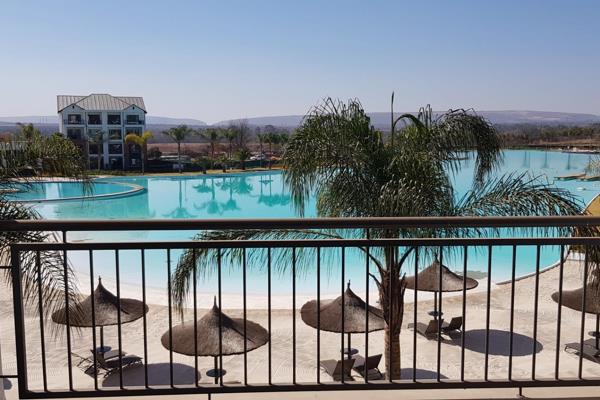 2 Bedroom Lagoon Facing Apartment in the Second Floor. This apartment has 2 bathrooms, a ...