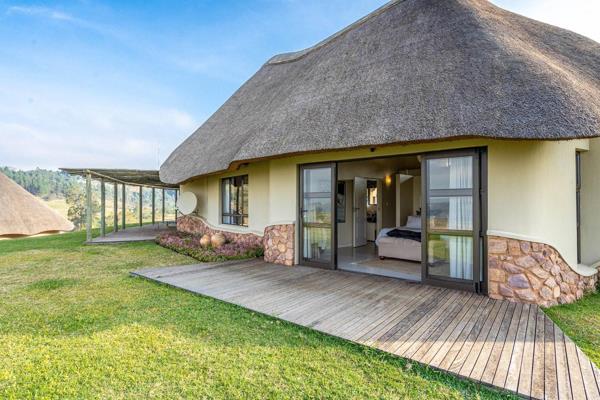 This simply marvellous decorator- designed home on the upmarket PheZulu Estate boasts luxury finishes along with superb views over the ...