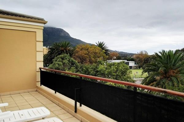 Discover a inviting two bedroom unit in Newlands, Cape Town, combining comfortable ...