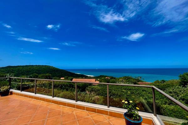 Magnificent top-floor apartment with commanding 180-degree sea views and lush coastal ...
