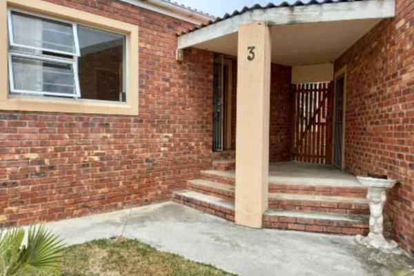 Low maintenance, aluminum windows, open plan living area leading to the outdoor braai ...