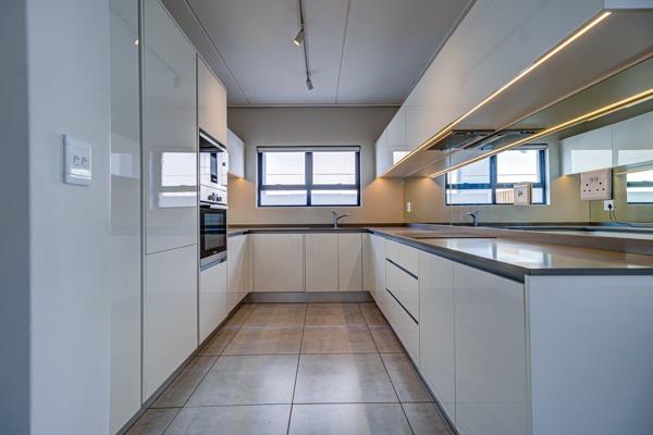 Discover contemporary living in this spacious, unfurnished ground-floor apartment featuring three well-appointed bedrooms and two ...