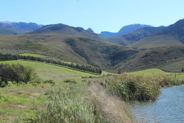 Situated on the southern slopes of the Riviersonderend mountain range, this 118-hectare irrigation farming enterprise is blessed with a ...