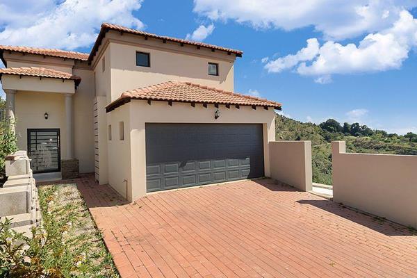 This is a family home in secure estate overlooking roodekrans hills.

Come home to a ...