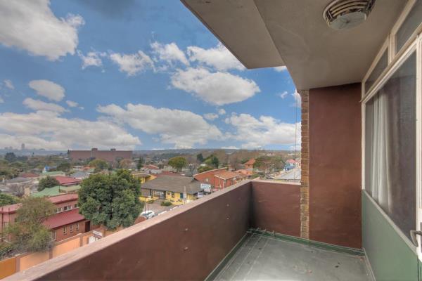 Fully renovated and modernised 2 bedroom 1 bathroom apartment with 2 north-facing balconies with a lovely view of Sandton city ...