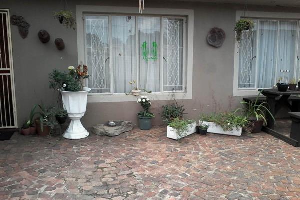 A neatly presented garden cottage with an open-plan lounge, dining room, shower, toilet, and basin. This cottage has its own patio ...