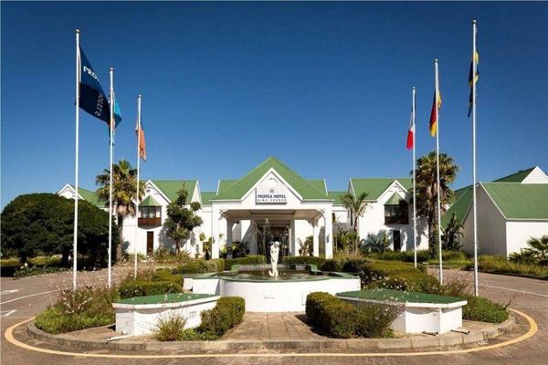 Within the magnificent 4 Star King George Hotel by Marriott, overlooking the George Golf ...