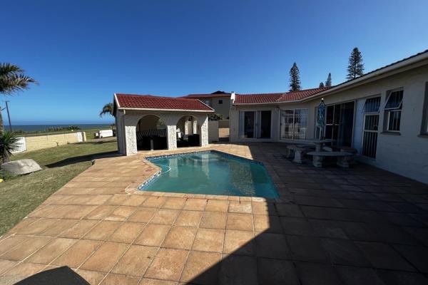 This amazing, air-conditioned 6-bedroom house is located on Uvongo/ Manaba Beach. This property includes 6 bedrooms and 5 bathrooms.  ...