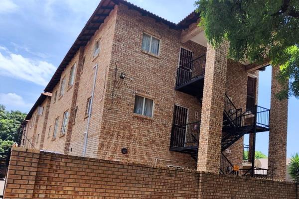 Ground floor unit . . .
2 Bedroom apartment with a bathroom, lounge and kitchen . . .
Single carport.