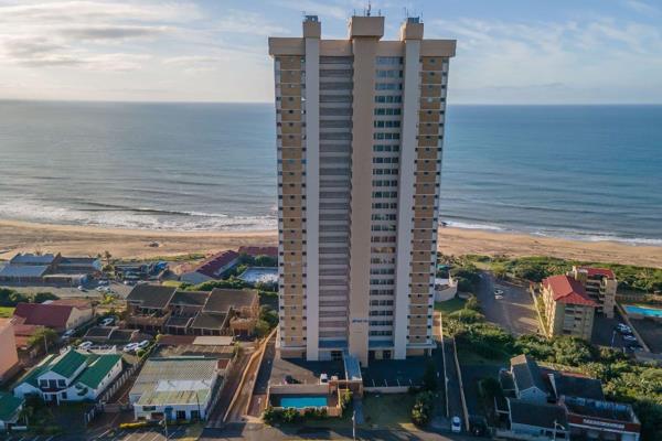 Step into a newly revamped unit with incredible sea views!
This high-rise building in Amanzimtoti is sought after for its location and ...