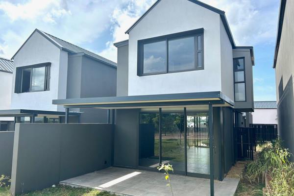 Modern 2 bedroom duplex in The Woods -a stylish new development within Elaleni Coastal Estate.  Downstairs is all glass and open plan ...