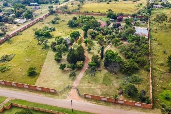 2.6 ha of land to do with what you will.  

Currently zoned agricultural with an annexure containing permission to develop a Hotel ...