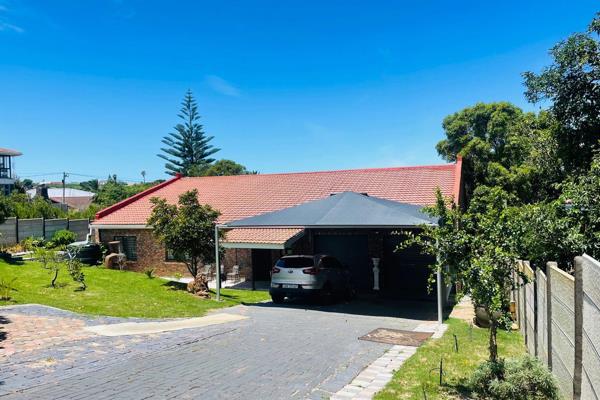 This low-maintenance single-story home with a walled irrigated garden and a boma is the ...