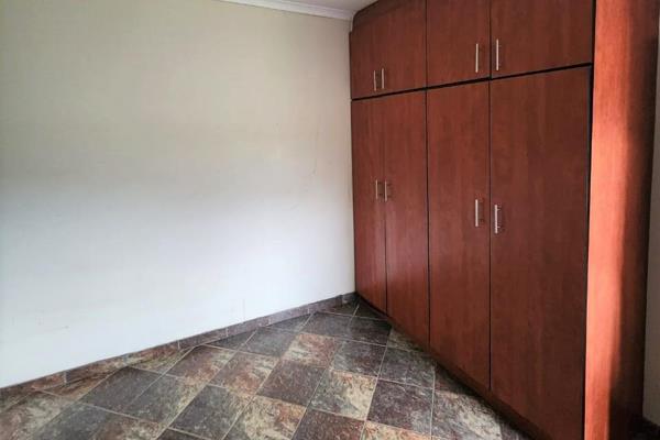 Spacious room with built-in cupboards to rent!

Neatly tiled bathroom to share between 2 rooms!

Secure parking!

Prepaid ...