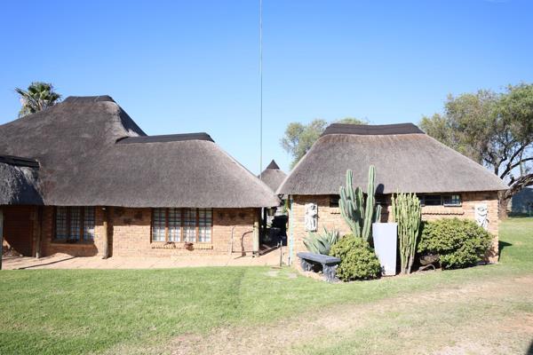 Escape the hustle and bustle of city life and embrace the tranquility of country living with this exceptional farm, ideally situated ...