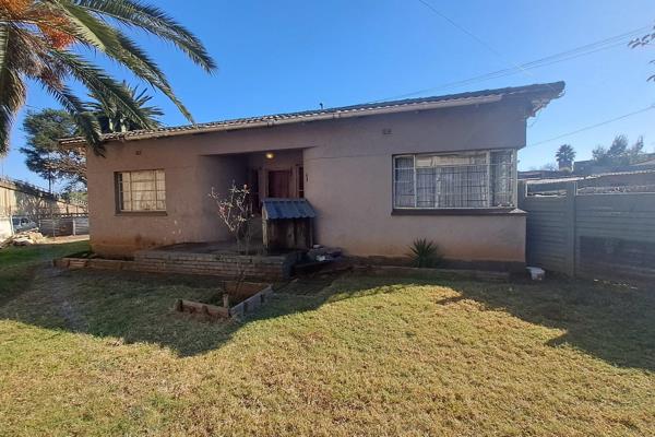 This Golden Oldie has so much potential. The yard is huge with enough space for ...