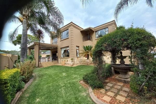 This home in the sought-after security estate, Sovereign Parks is in immaculate ...