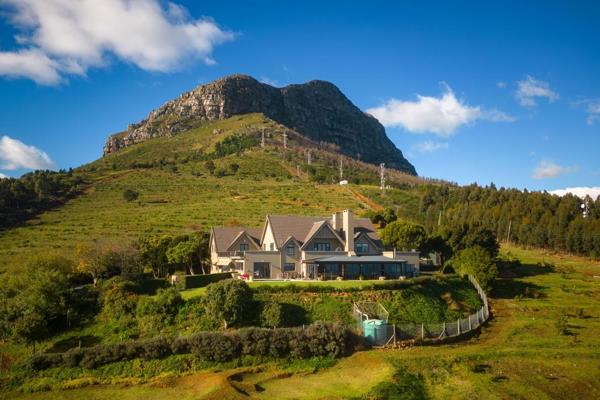 Exclusive lifestyle farm on the slopes of the Helderberg Mountain; with exceptional views, a manor house, farmhouse and two cottages. ...