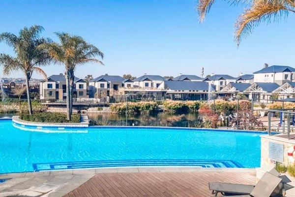 Discover unparalleled luxury living in the heart of Waterfall at Polofields Lifestyle Estate. This 3-bedroom garden apartment combines ...