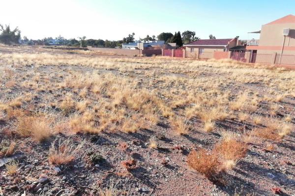 This vacant land is situated in a residential neighborhood and surrounded by a variety ...