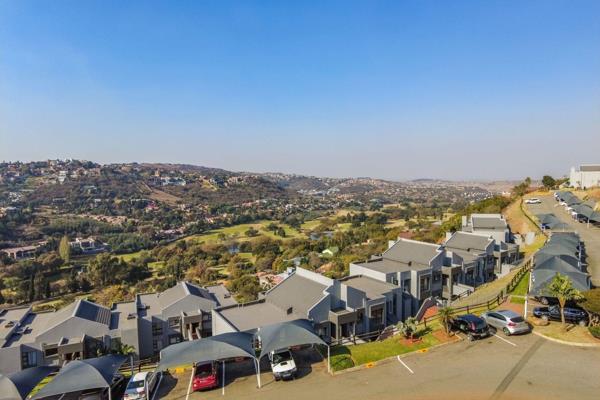 The kitchen offers ample space for two appliances and features an open-plan layout with ...