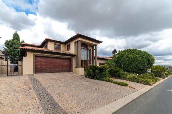 Nestled within the prestigious Gary Player Golf &amp; Lifestyle Estate, this captivating ...