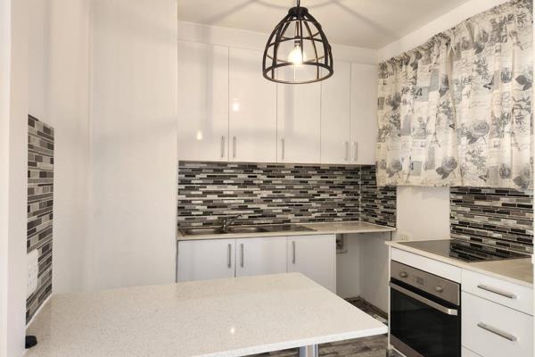 A modern, freshly painted one-bedroom apartment in Civic Towers is perfect for a young ...