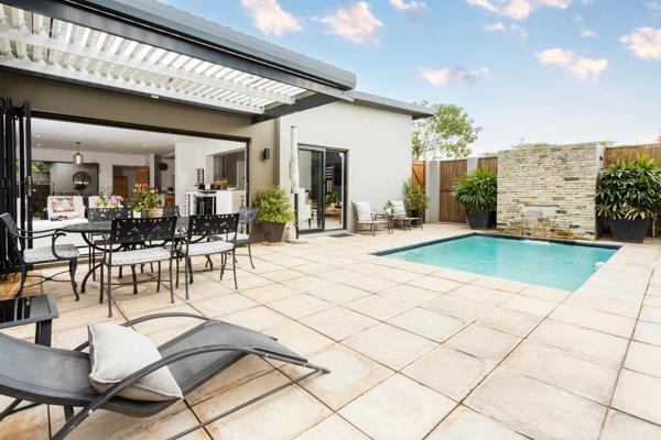 DUAL MANDATE -Discover the hidden gem of Ballito: Brooklyn Estate. This exquisite 3-bedroom home offers top-end finishes and ...