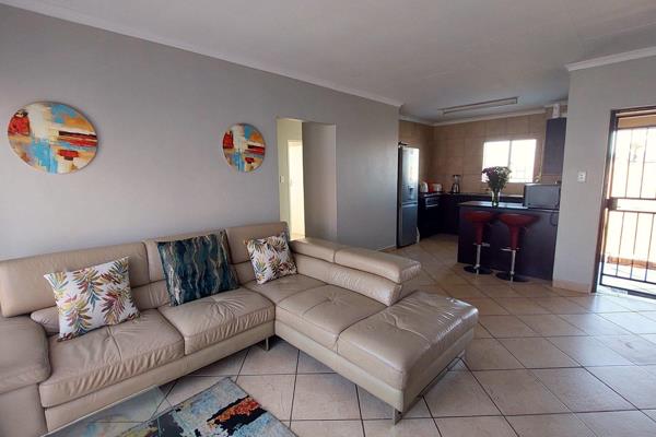 This top floor apartment is spacious and light, with an open plan kitchen and living ...