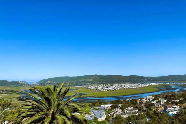 Unbeatable views, green cliffs, Knysna’s tranquil lagoon from the waves of the Indian Ocean alongside The Knysna Heads, visible from ...