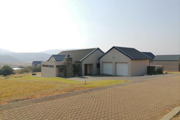 Live comfortably in this ideal home with stunning views, situated on a Links-style golf estate. 
The property has a modern style that ...