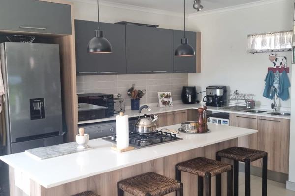 This modern two bedroom, two bathroom apartment is fully tiled throughout with gas geyser.
The kitchen is open plan with a gas stove ...