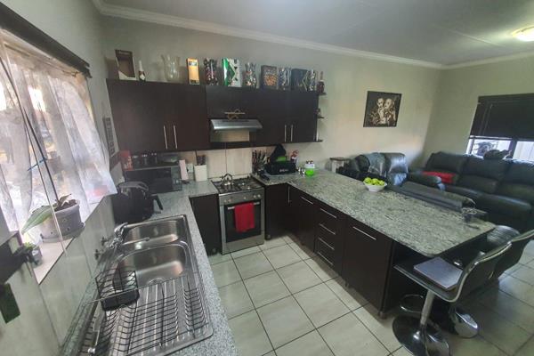 This Modern property offers you the following. 

No load shedding for this townhouse the complex has back up generators. 
Secure ...