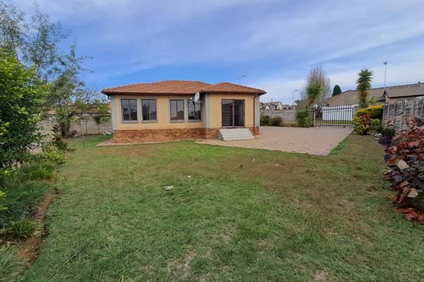 Three bedrooms two bathrooms open plan kitchen with carport 472 square meters yard