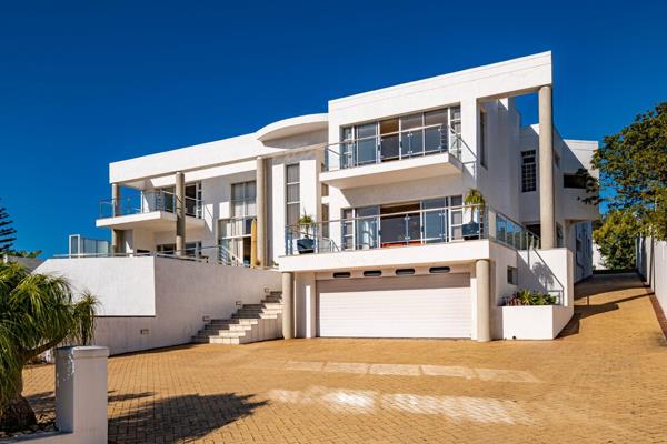 This stunning modern home is perched on a hill, offering breathtaking sea views and luxurious living. If you&#39;re looking for a ...