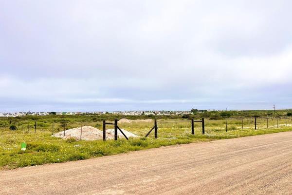 Experience the enchantment of a serene life in Jacobsbaai with this exquisite corner ...