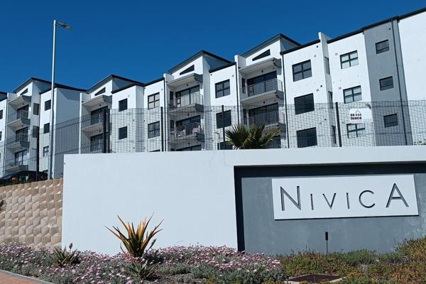 Welcome to this exquisite luxury first floor NIVICA apartment that epitomises coastal ...