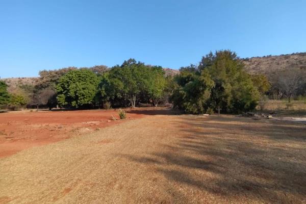 Embrace the allure of a serene 8.1-hectare vacant land, nestled at the base of the majestic Magalies Mountain. This enchanting parcel ...