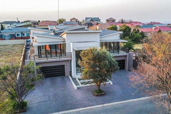 Experience elevated living in this exquisite 5-bedroom house nestled within the prestigious Aquavista Mountain Estate, where an ...