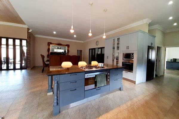 Space is the key word in this family house. Lovely open plan living areas with indoor braai area. Stunning Kitchen with gas stove ...